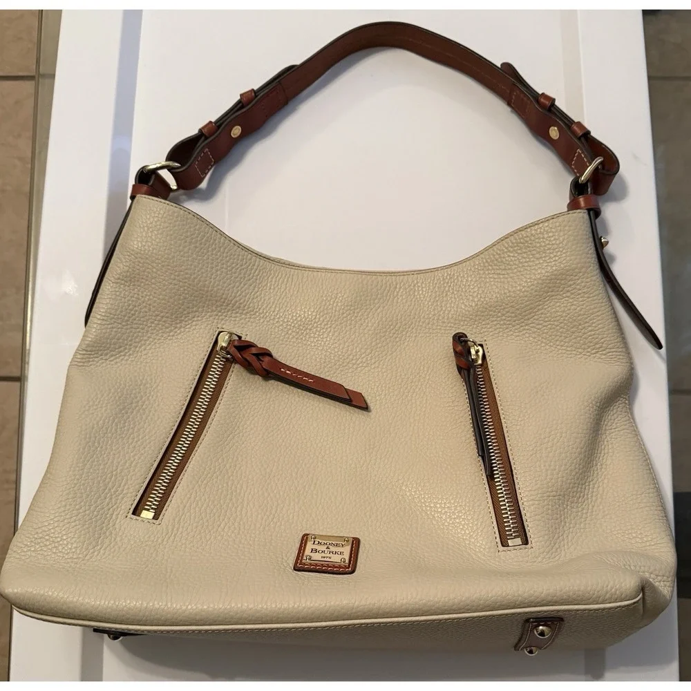 Dooney & Bourke Hobo Bag Women Large Cream Pebbled Leather Tan Trim Logo Plaque